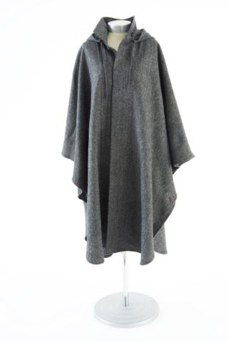 Cape in grey by LUCAN Fashion. Unisex cape shown in green herringbone with chartreuse top stitching. Features high collar for warmth and look. The product SKU is LF006B.